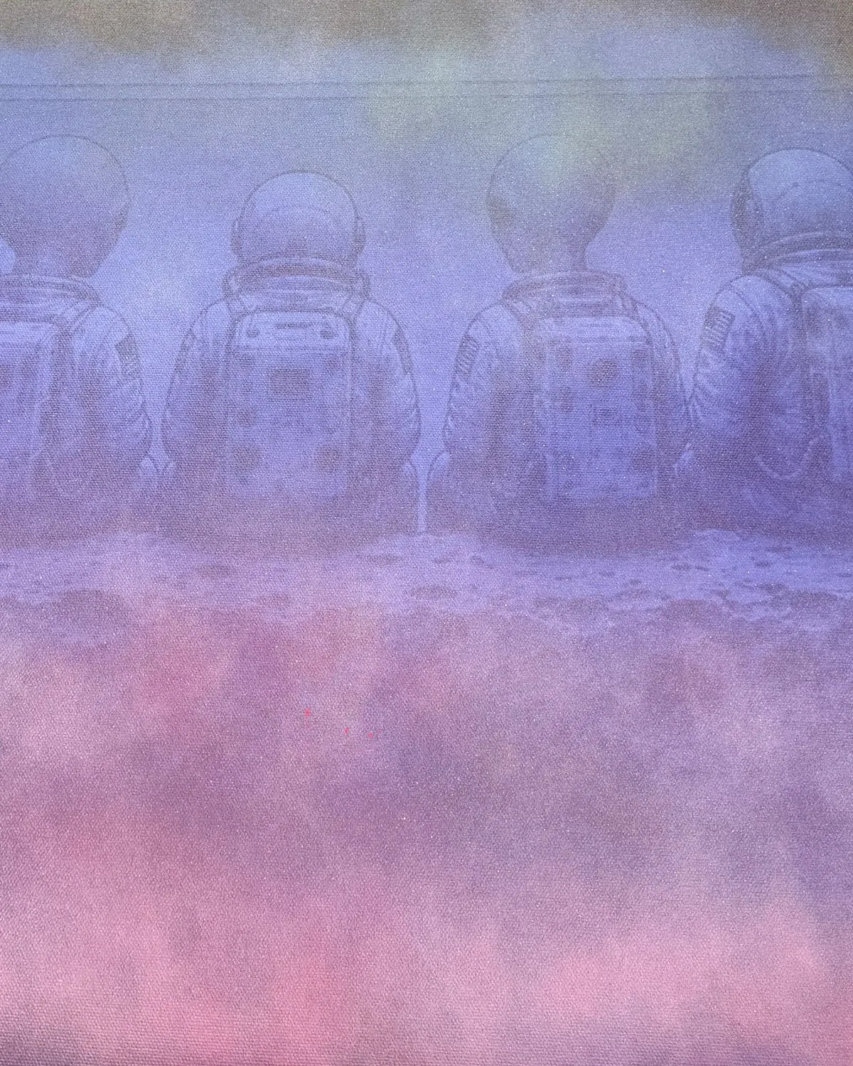 Close-up of spray paint layered over the printed canvas